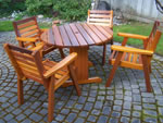Dining Club Chairs around a round patio table